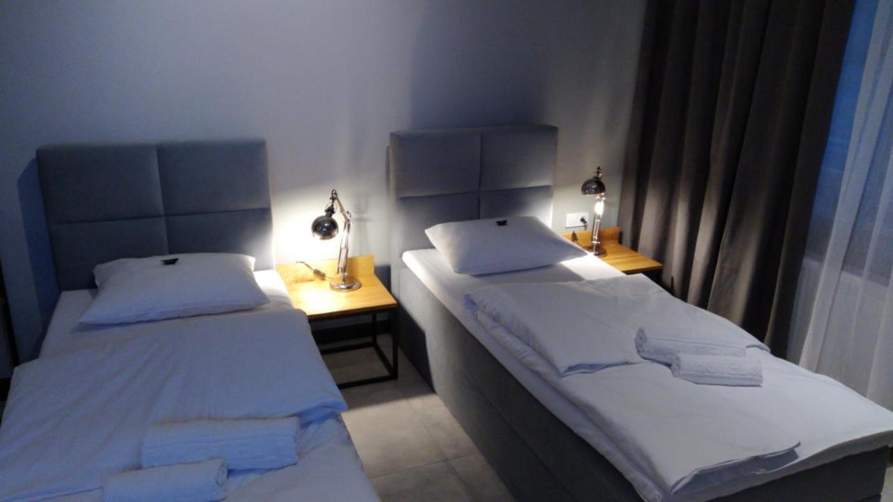 Apartsuites I Sorau Żary Buitenkant foto A room at the hotel