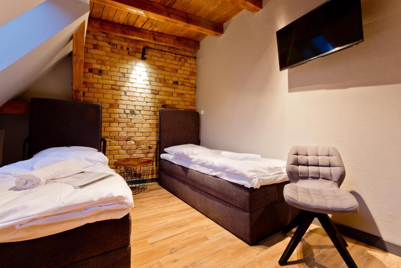 Apartsuites I Sorau Żary Buitenkant foto A room at the hotel