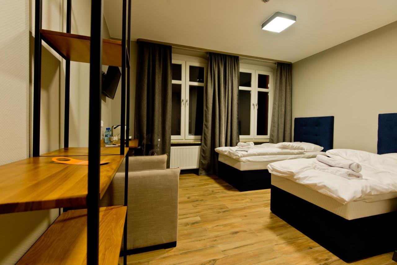 Apartsuites I Sorau Żary Buitenkant foto A room at the hotel