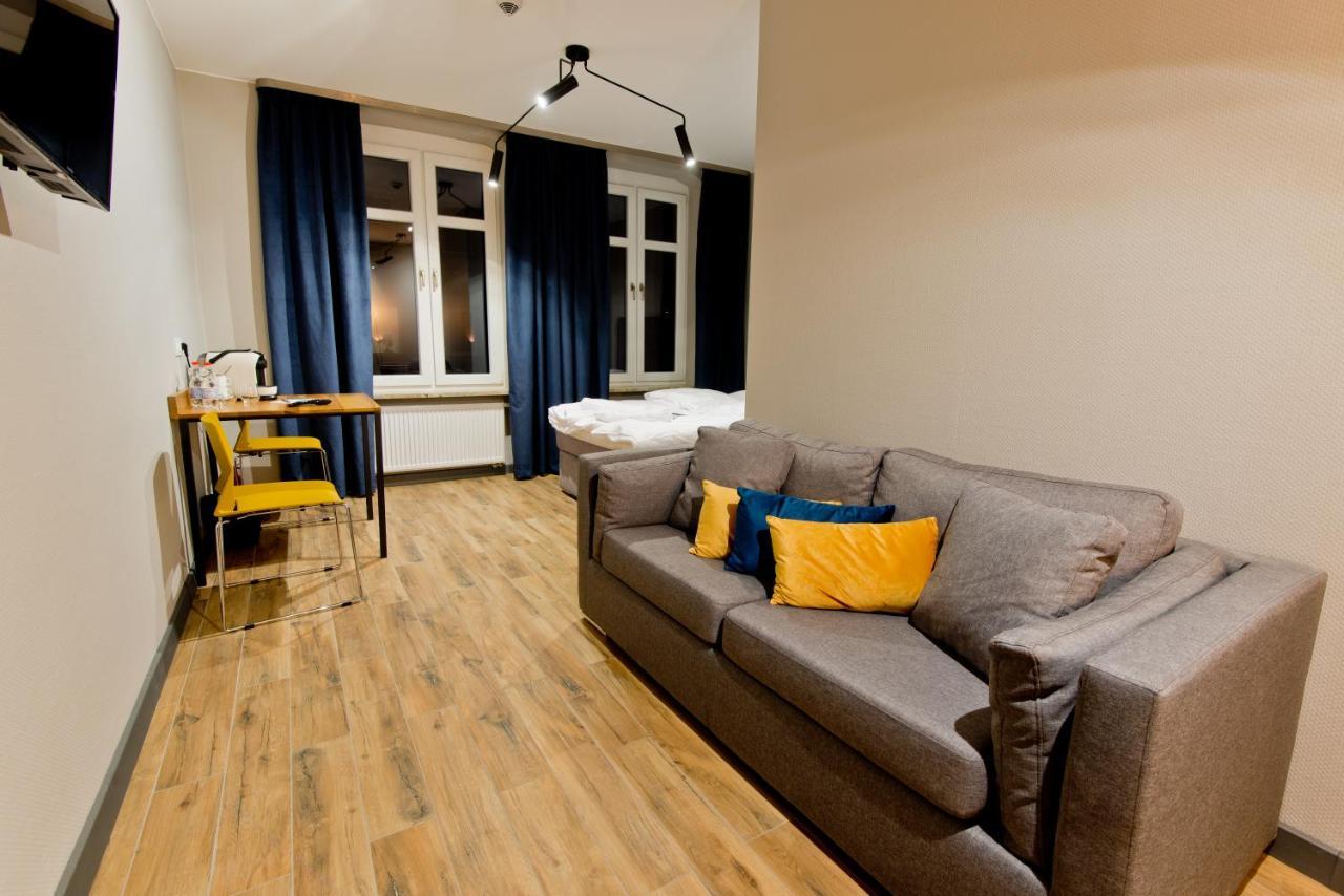 Apartsuites I Sorau Żary Buitenkant foto A typical studio apartment in Berlin, Germany