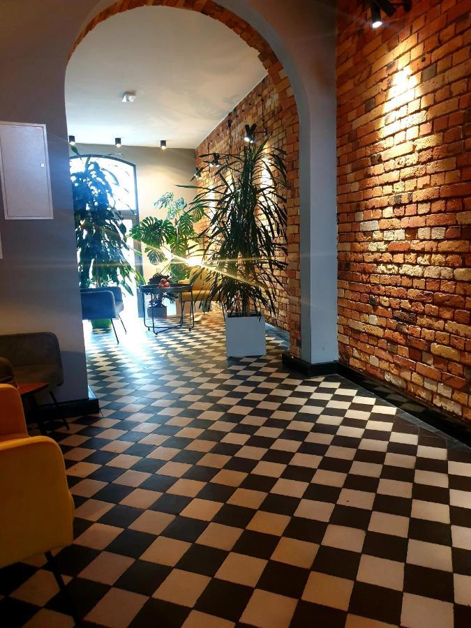 Apartsuites I Sorau Żary Buitenkant foto Interior of the hotel